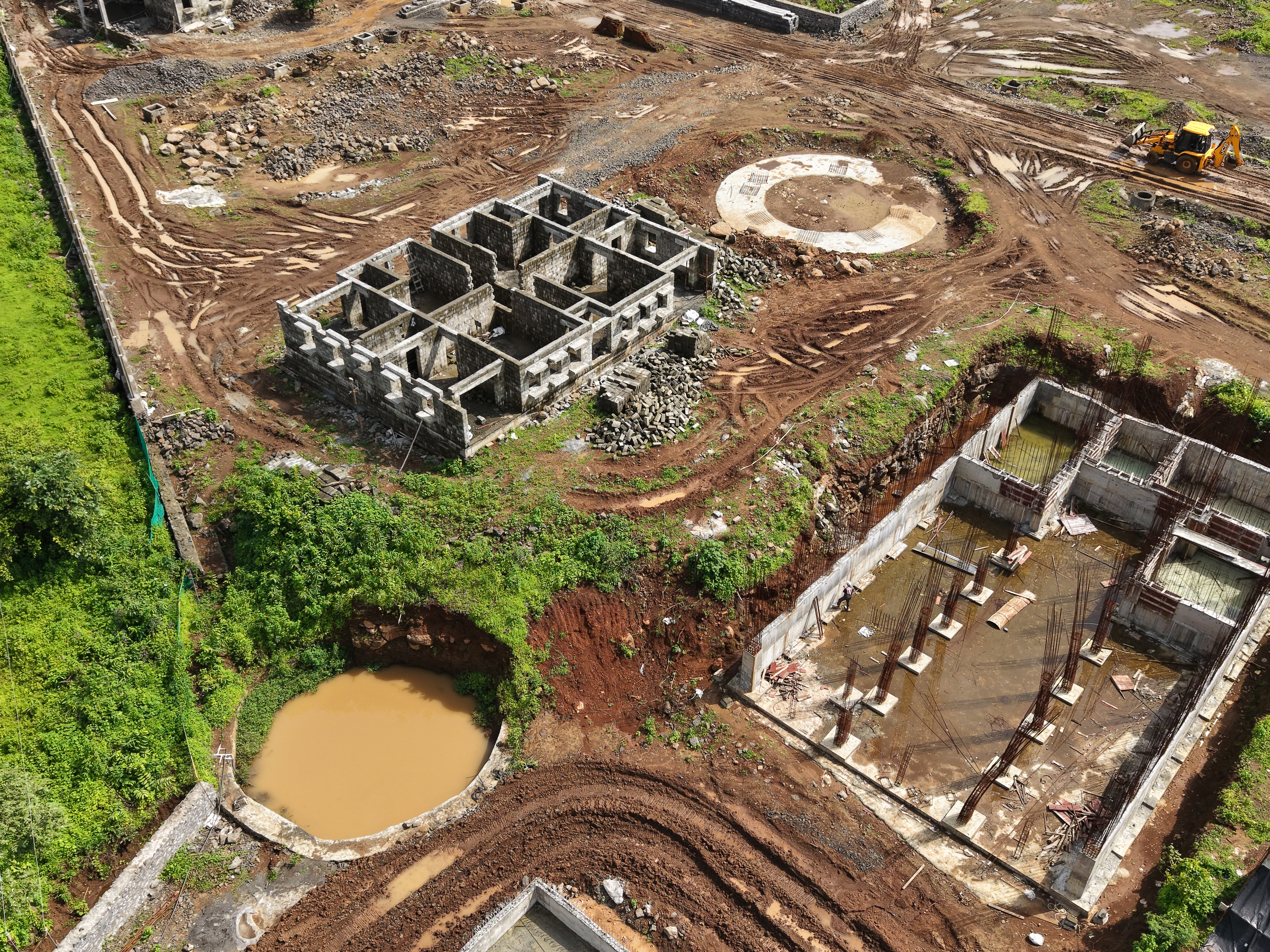 Aerial view of foundations and water storage at the Hi 5 Basketball Academy